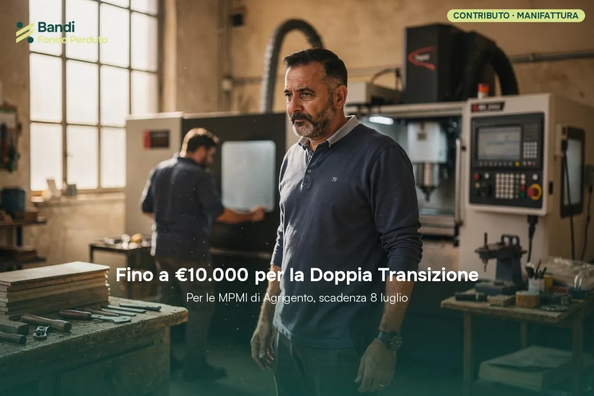 Imprenditore che consulta un tablet in un'azienda manifatturiera ad Agrigento, simbolo di innovazione e sostenibilità.
